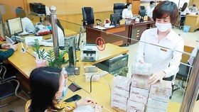 Sixteen banks reduce lending interest rates by more than VND8.86 trillion