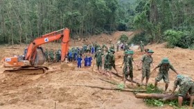 Search and rescue workers are searching for victims of the landslide at ranger station 67