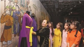 Young people visit Ao Dai Museum in HCMC. (Photo: SGGP)