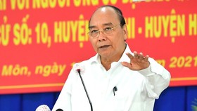 State President Nguyen Xuan Phuc speaks at the conference. (Photo: SGGP)