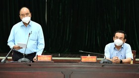 State President Nguyen Xuan Phuc speaks at the meeting. (Photo: SGGP)