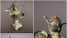 An ancient human-shaped lamp in the Vietnam National Museum of History