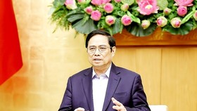 Prime Minister Pham Minh Chinh chairs the meeting on October 16 (Photo: VNA)
