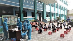 Học sinh Trường Tiểu học Thạnh An xét nghiệm Covid-19 vào cuối tháng 10 trước khi thực hiện thí điểm trở lại trường học trực tiếp