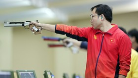 Xạ thủ Hoàng Xuân Vinh sẽ trở lại đấu trường Olympic bằng vé mời.