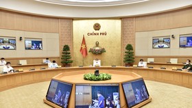 Thủ tướng Phạm Minh Chính triệu tập cuộc họp trực tuyến khẩn cấp với 2 tỉnh Bắc Giang, Bắc Ninh. Ảnh: VIẾT CHUNG