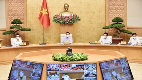 Thủ tướng Chính phủ Phạm Minh Chính chủ trì phiên họp trực tuyến toàn quốc về tình hình, giải pháp cấp bách phòng, chống dịch Covid-19. Ảnh: VIẾT CHUNG