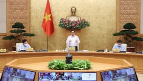 Thủ tướng Phạm Minh Chính chủ trì họp Chính phủ thường kỳ tháng 9. Ảnh: VIẾT CHUNG