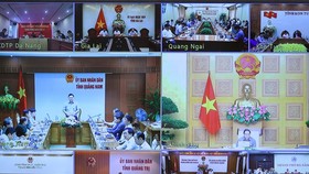 Thủ tướng Phạm Minh Chính chủ trì họp về khắc phục hậu quả cơn bão số 4. ẢNH: VIẾT CHUNG