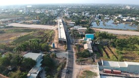 The National Highway No. 50 expansion project through Binh Chanh District is one of the city's major project (Photo: SGGP)