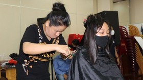 Coronavirus: City bar­ber­shops, hair salons reopen at 50 percent capacity