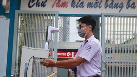 Grade 9 and 12 students in HCMC return to schools in person today