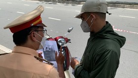 City traffic police revoke nearly 20,000 driver’s licenses in three peak months