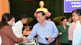 City chairman works, resolves many proposals of Binh Tan District