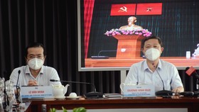 Đồng chí Dương Anh Đức, Phó Chủ tịch UBND TPHCM và đồng chí Lê Văn Minh, Phó Trưởng Ban Thường trực Ban Tuyên giáo Thành ủy TPHCM chủ trì tại điểm cầu Trung tâm Báo chí TPHCM