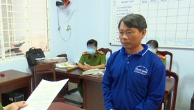 Đối tượng Nguyễn Thành Long vừa bị khởi tố, bắt tạm giam. Ảnh: NGHIÊM TÚC