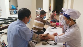 Lâm Đồng bắt đầu tiêm vaccine phòng Covid-19 cho lái xe, phụ xe tải