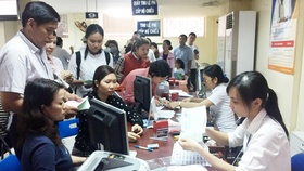 Người dân đăng ký nhận kết quả cấp hộ chiếu qua bưu điện