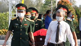Trang trọng lễ truy điệu và an táng 15 hài cốt quân tình nguyện Việt Nam hy sinh tại Lào ​