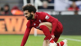 Mohamed Salah đang khiến chấn thương thêm nghiêm trọng. Ảnh: Getty Images