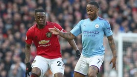 Man.United và Man.City có thể không nhập cuộc ngày từ đầu của mùa giải mới. Ảnh: Getty Images