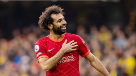 Mohamed Salah đã thay đổi ý định rời sân Anfield. Ảnh: Getty Images