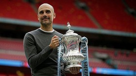 HLV Pep Guardiola chỉ thắng một FA Cup sau 4 lần vào bán kết. Ảnh: Getty Images