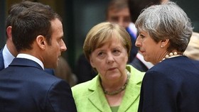 Từ trái qua: Tổng thống Pháp, Thủ tướng Đức và Thủ tướng Anh muốn bảo vệ thỏa thuận hạt nhân Iran. Ảnh: AP