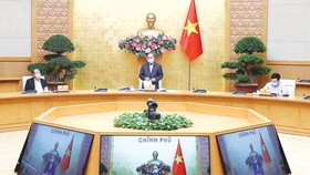 Thủ tướng Nguyễn Xuân Phúc phát biểu kết luận cuộc họp. Ảnh: TTXVN