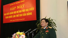 Đại tướng Ngô Xuân Lịch phát biểu tại buổi gặp mặt. Ảnh: TTXVN 