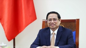 Thủ tướng Phạm Minh Chính điện đàm với Thủ tướng Hàn Quốc Han Duck-soo. Ảnh: TTXVN