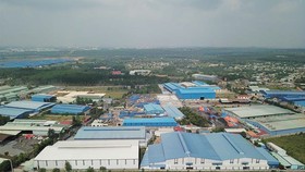 Nhà xưởng trái phép trong khu quy hoạch cụm công nghiệp Phước Tân. Ảnh: TTXVN