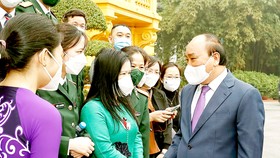 Chủ tịch nước Nguyễn Xuân Phúc gặp mặt thân mật đoàn đại biểu cán bộ y tế tiêu biểu toàn quốc nhân Kỷ niệm 67 năm Ngày Thầy thuốc Việt Nam. Ảnh: TTXVN