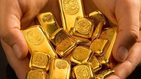 Giá vàng thế giới đạt mốc cao nhất trong hơn một tháng qua