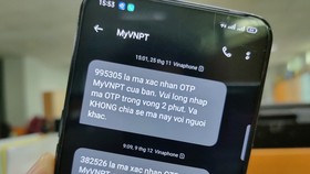 74% người Việt muốn dùng mã OTP qua SMS trong mọi giao dịch thanh toán điện tử - Ảnh: ĐỨC THIỆN