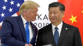 Tổng thống Mỹ Donald Trump (trái) và Chủ tịch Trung Quốc Tập Cận Bình. Ảnh: AP