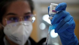 A nurse in northwestern Spain fills a syringe with AstraZeneca’s Covid-19 shot. Spain was one of several EU countries saying they would restart vaccinations with the jab. © AFP via Getty Images
