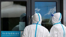 Các chuyên gia của WHO tới Vũ Hán, Trung Quốc điều tra nguồn gốc Covid-19 hồi tháng 1 (Ảnh: Reuters).