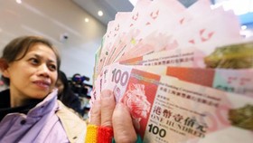 Trung Quốc ấn định mức tiền mặt được rút ở nước ngoài
