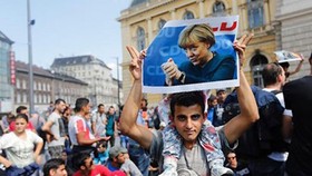 Thủ tướng Đức thừa nhận cuộc khủng hoảng di cư có thể quyết định số phận EU (Ảnh: AP).