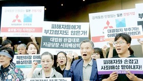 Người dân Hàn Quốc kêu gọi tẩy chay hàng hóa Nhật Bản. Ảnh: EPA