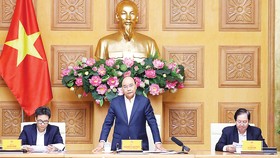 Thủ tướng Nguyễn Xuân Phúc phát biểu tại cuộc họp của Ban Chỉ đạo Trung ương về cải cách chính sách tiền lương, bảo hiểm xã hội và ưu đãi người có công. Ảnh: TTXVN