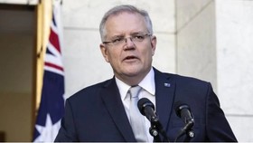 Thủ tướng Australia Scott Morrison đã công bố các hạn chế xã hội phòng chống dịch Covid-19 giai đoạn 3. Ảnh: Gary Ramage
