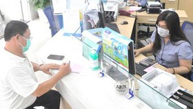 Xử lý nghiêm việc yêu cầu mua bảo hiểm khi cấp tín dụng