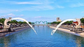 Phác thảo tượng cá chép hóa rồng bên bờ kè sông Maspero TP Sóc Trăng. Ảnh: Nhandan