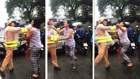 N​gười phụ nữ lớn tiếng chửi bới chiến sĩ CSGT. Ảnh cắt từ clip