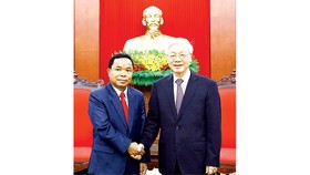 Tổng Bí thư Nguyễn Phú Trọng tiếp đồng chí Khamphan Phommathat, Bí thư Trung ương Đảng, Chánh Văn phòng Trung ương Đảng NDCM Lào