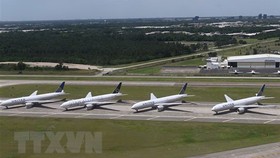 Máy bay của hãng hàng không United Airlines tại sân bay quốc tế George Bush, bang Texas, Mỹ. Ảnh: TTXVN