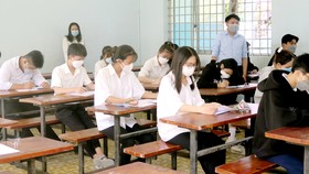 Học sinh lớp 12 Trường THPT Phước Kiển (huyện Nhà Bè, TPHCM) trong một tiết học 