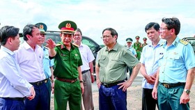 Thủ tướng Phạm Minh Chính kiểm tra, khảo sát dự án nhà ga T3 sân bay Tân Sơn Nhất, ngày 9-7-2022. Ảnh: TTXVN